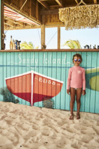 child playing on beach