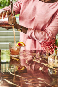 Lady making drinks